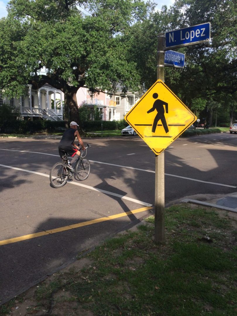 Despite new bike lanes and crosswalks, many New Orleans drivers continue to treat Esplanade Avenue as a thoroughfare built for cars exclusively. 