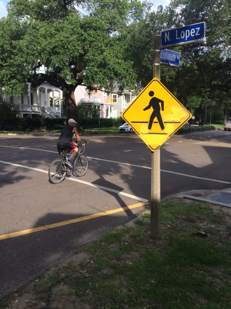 Despite new bike lanes and crosswalks, many New Orleans drivers continue to treat Esplanade Avenue as a thoroughfare built for cars exclusively.
